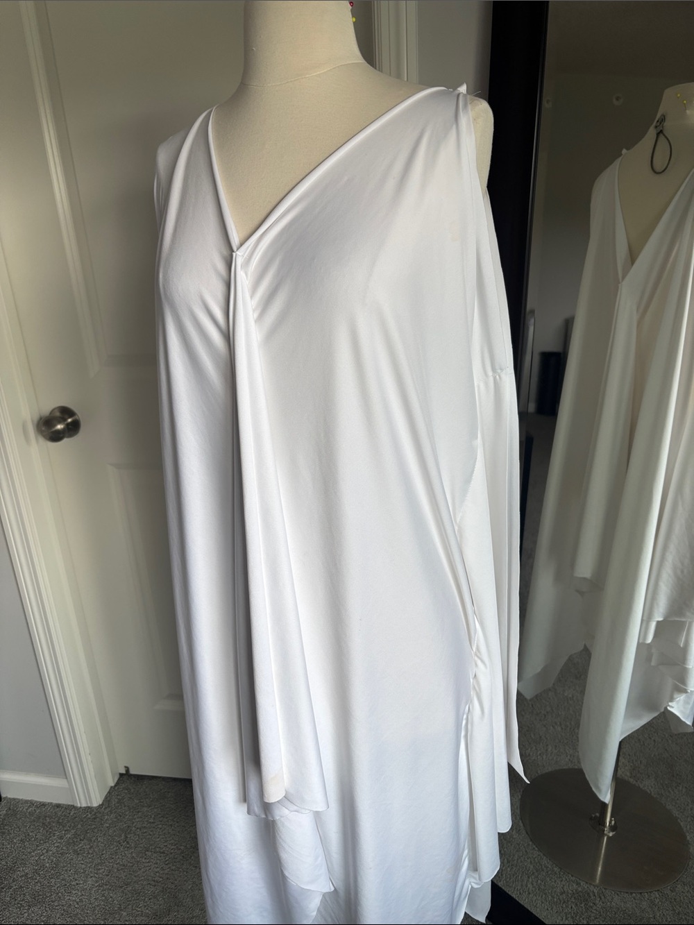 Elegant White V-Neck Draped Women's Dress in Lycra cover up.